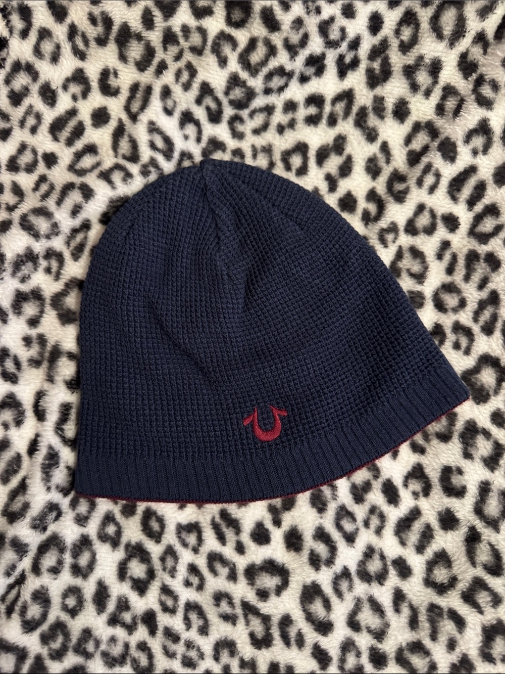 True Religion Navy Beanie with Red Horseshoe Emblem